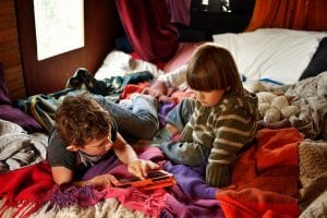 children playing in a campervan