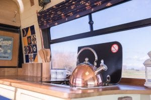 make a cup of tea in a campervan