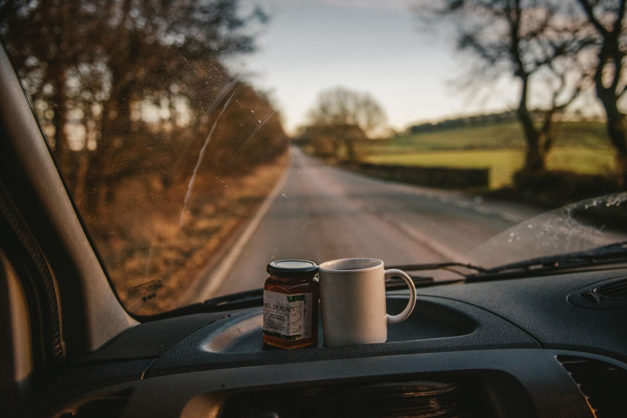 Tea and honey in a campervan on a roadtrip in Ireland