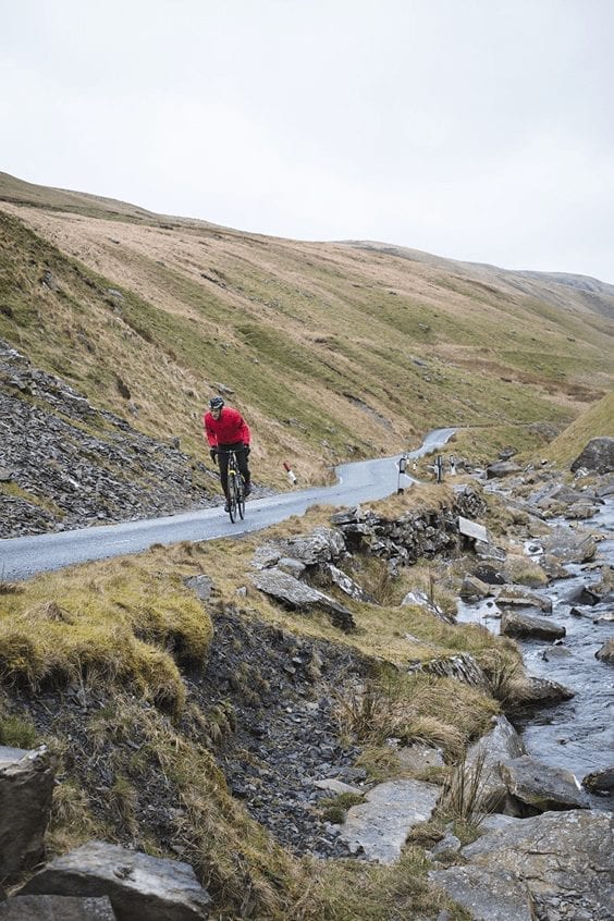 A man cycling in Wales