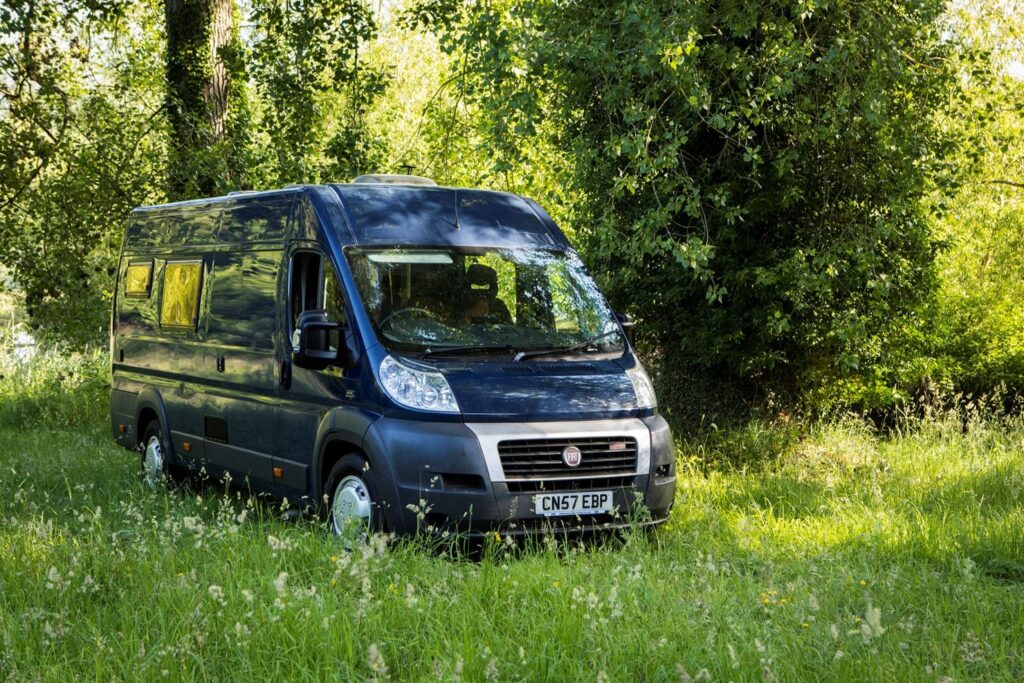 a campervan in a field