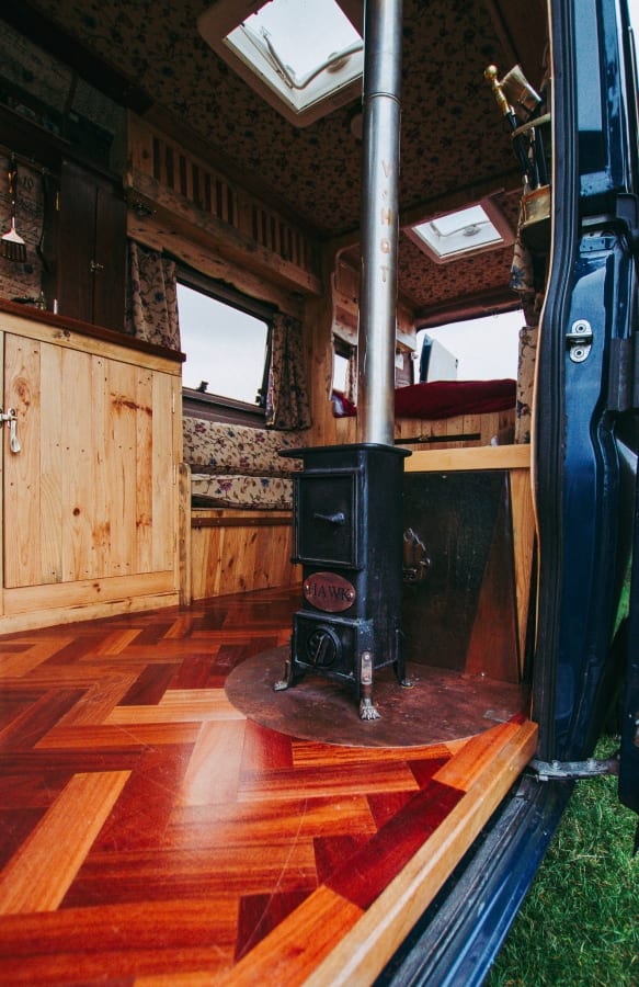 a wood burner inside a campervan conversion