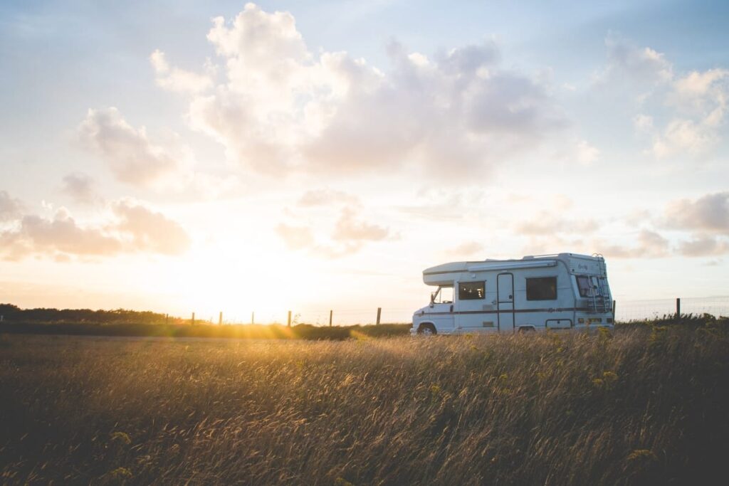 A retro campervan in a field