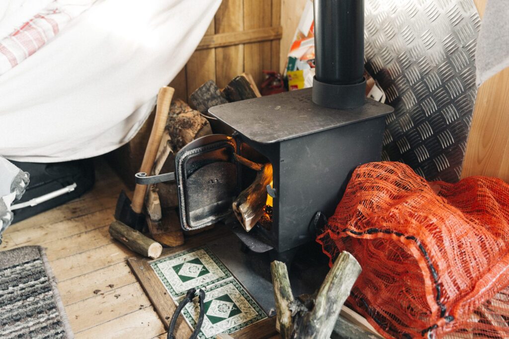 a wood burner in a campervan