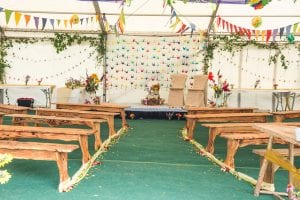 wedding marquee with handmade decorations and origami cranes before a wedding