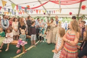 alternative wedding in a marquee in a field