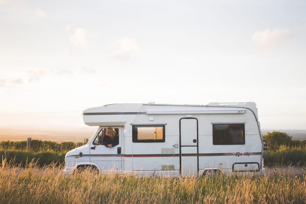 A retro campervan in a field