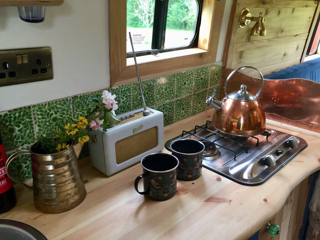 Making tea in a campervan whilst wild camping
