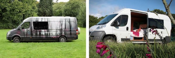 The exterior of two campervans. One is plain white and the other has silhouetted trees spray painted on