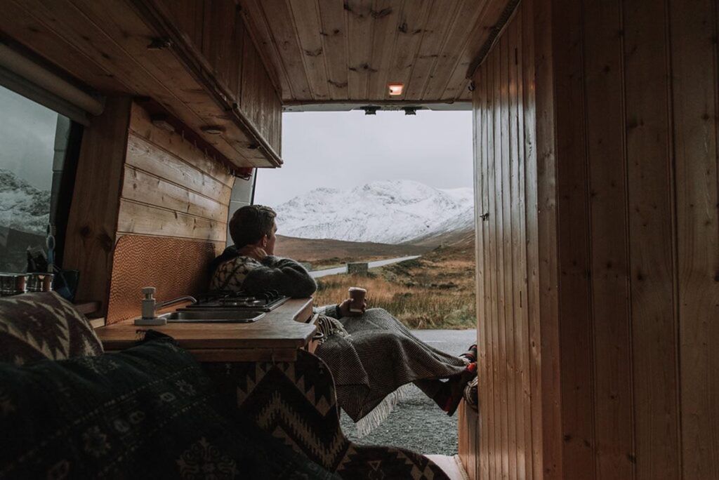 Snowy mountains of scotland out the back of Macintyre the campervan