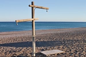 keep clean on the beach by using the free showers available