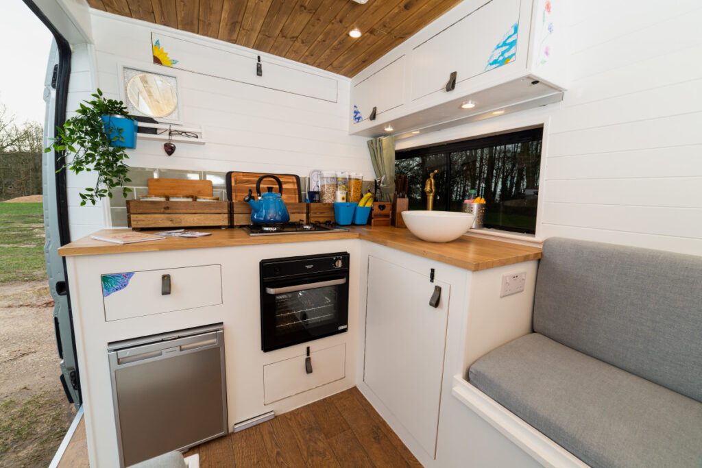 modern campervan kitchen with oven