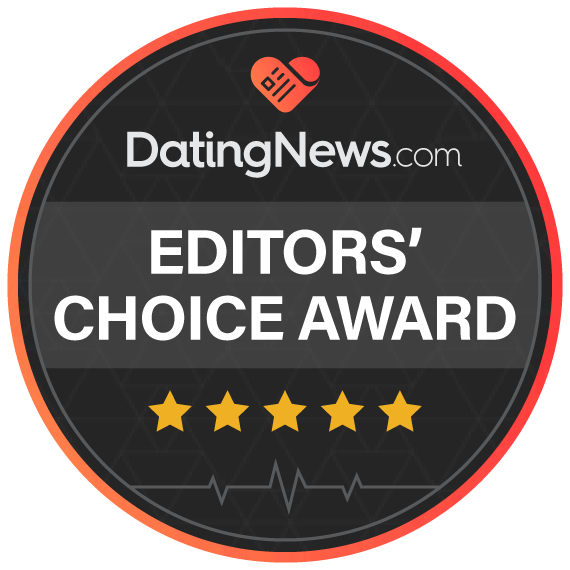 A circular badge with "DatingNews.com" at the top in white text. Below it, "EDITORS' CHOICE AWARD" is written in bold white letters. Underneath this, there are five gold stars lined up horizontally. The badge has a gradient red and orange border.