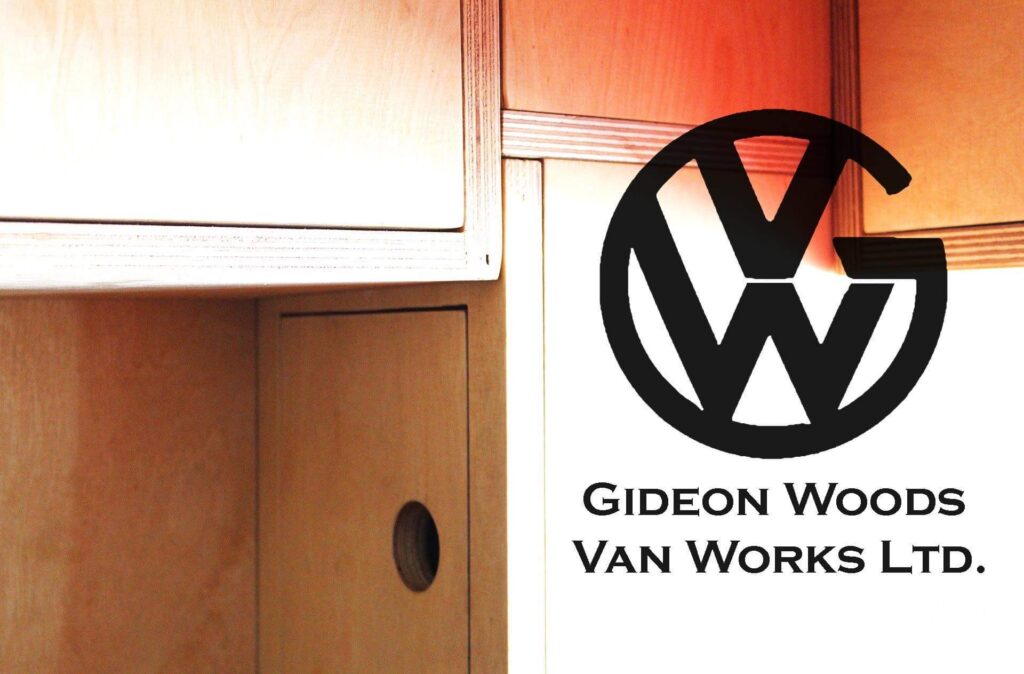 A wooden cabinet with a light finish occupies the left half of the image. On the right, there is a black logo featuring the letters "GW" inside a circle, and below it, the text reads "Gideon Woods Van Works Ltd" in black font.