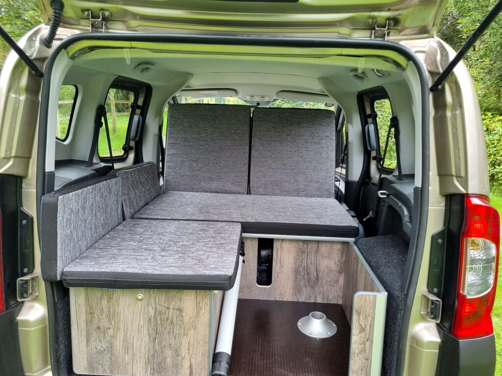 Qubo cheap camper conversion