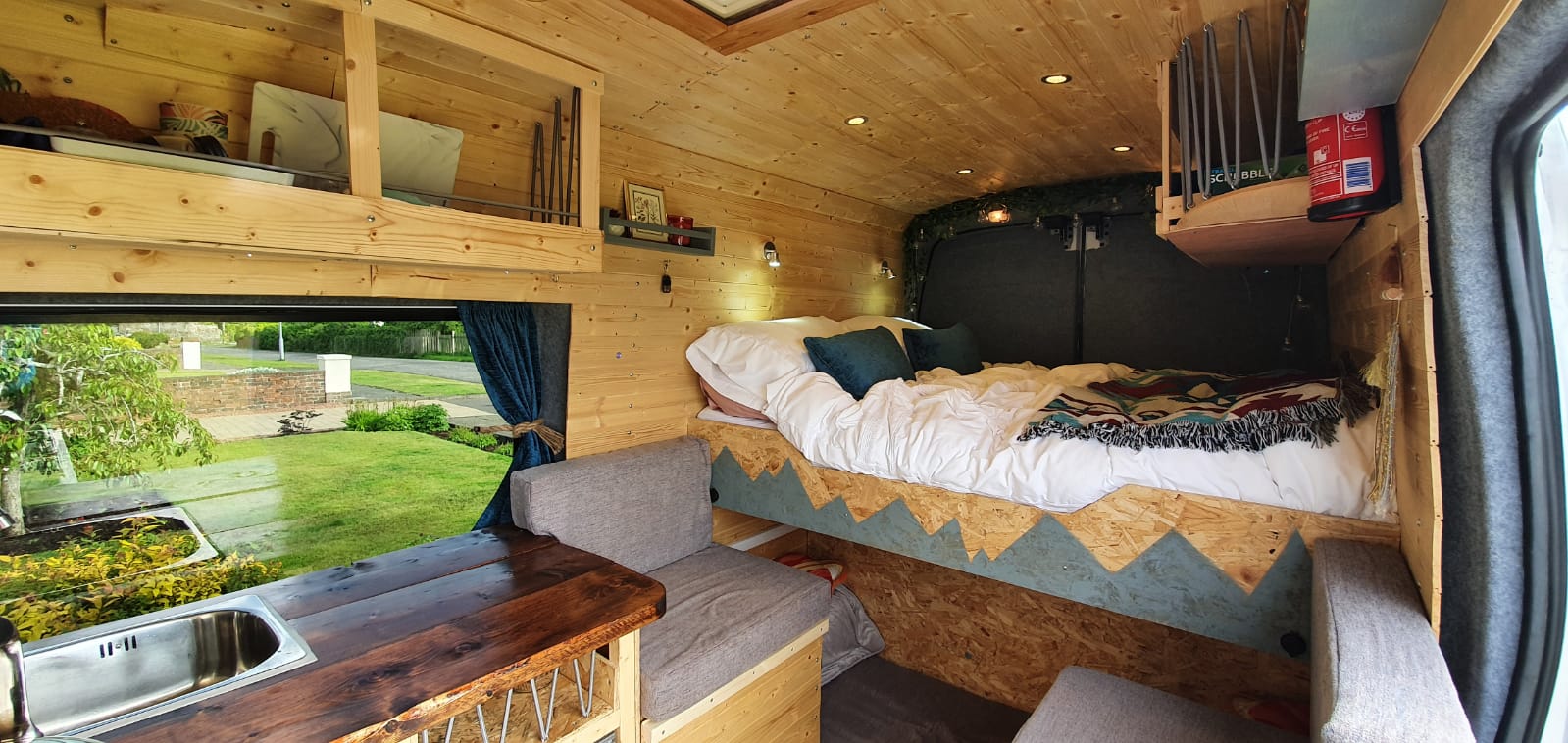 Cosy wooden campervan with bed 